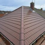 Brown interlocking roof tiles ridge replacement West Yorkshire