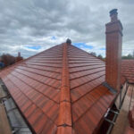Red interlocking tile roof ridge chimney West Yorkshire